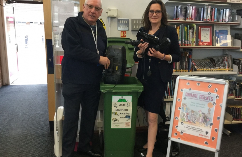 Rebecca Harris and Councillor Chas Mumford encourage recycling 