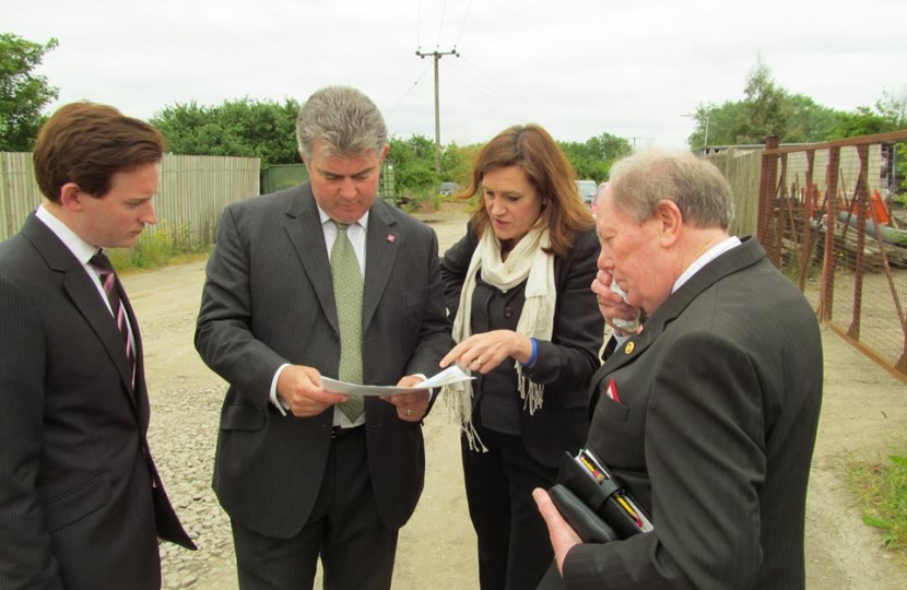 Showing the Minister a possible site for the third road off Canvey